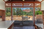 The kitchen overlooks the private outdoor patio